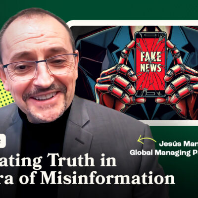 A smiling man in glasses with text reading "Navigating Truth in the Era of Misinformation" beside an image of hands holding a phone with "Fake News".