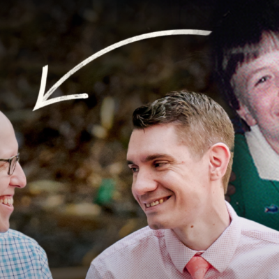 Two smiling men in shirts; an arrow points to an old photo of a young boy smiling in a green shirt.