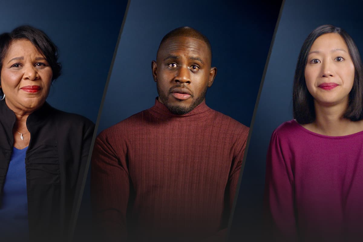 Three people against a blue backdrop, conveying diverse backgrounds, and with serious looks on their faces.